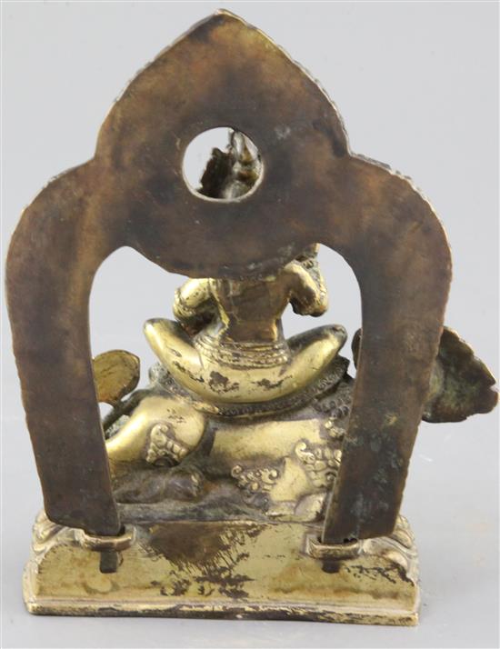 A Tibetan gilt bronze figure of Vaishravana, height 17.5cm
